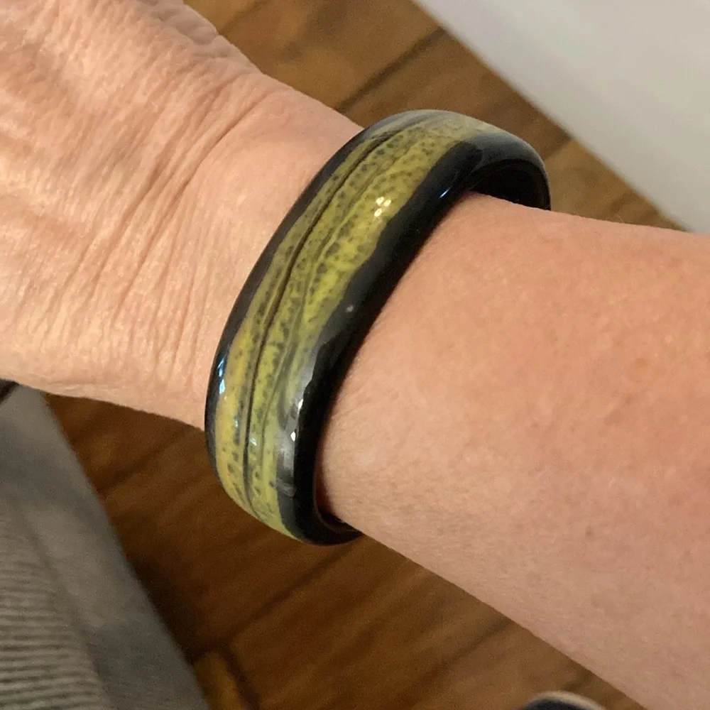 glass bangle bracelet black yellow abstract design